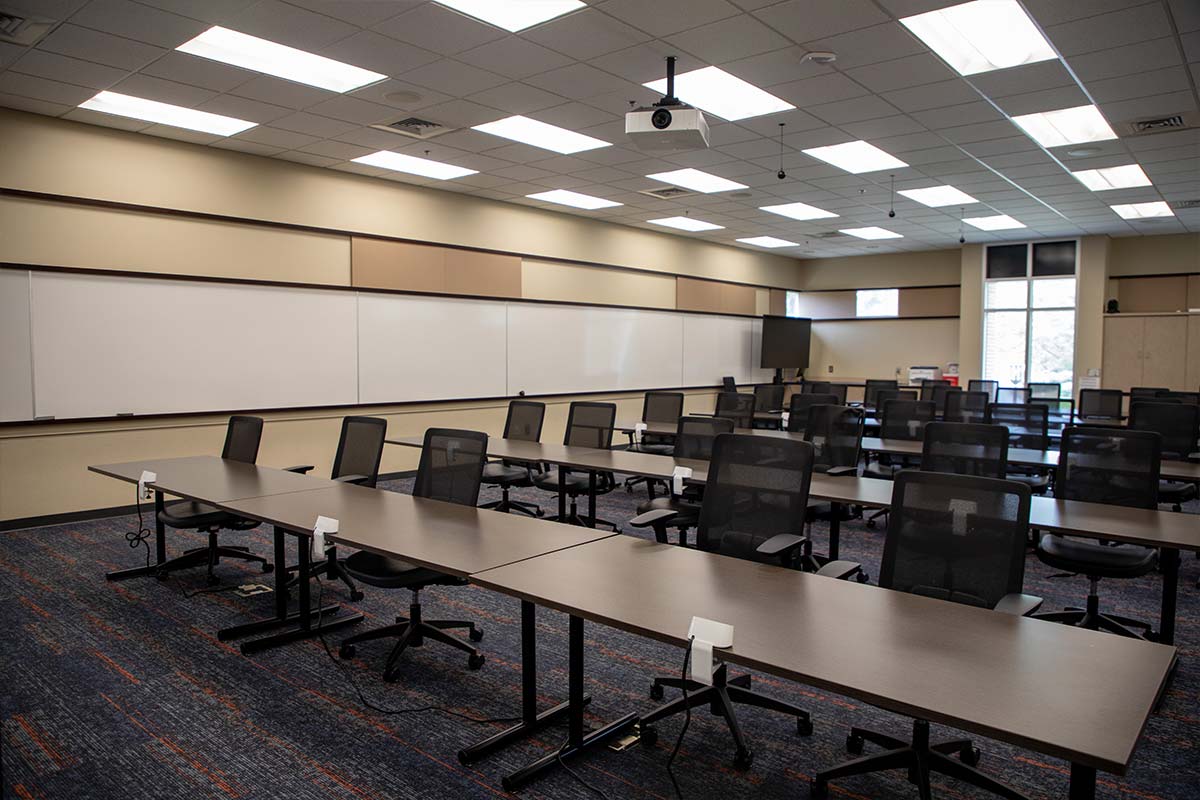 College of Business high tech classroom looking at the desks