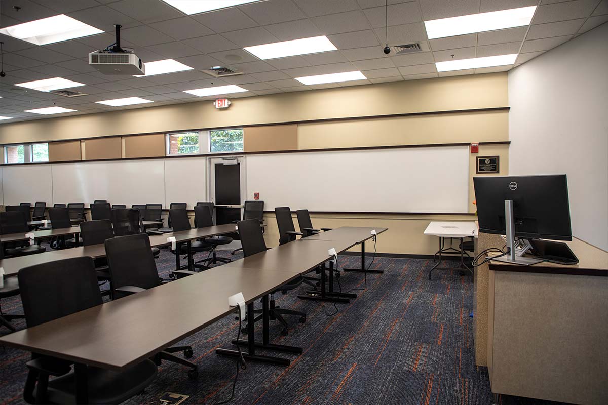 College of Business high tech classroom looking at the podium