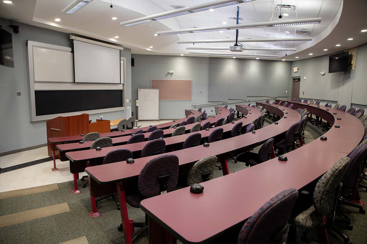 Lecture Hall high tech tiered classroom looking at the board from the left