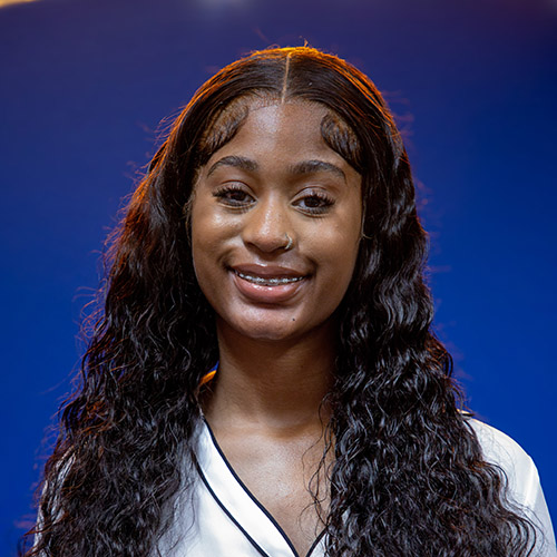 Image of Kennedy Wallace, with her hair down in relaxed waves