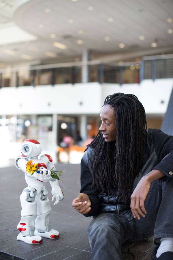 Student and robot talk through robotics
