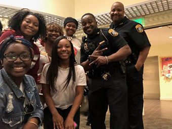 public safety officers with students